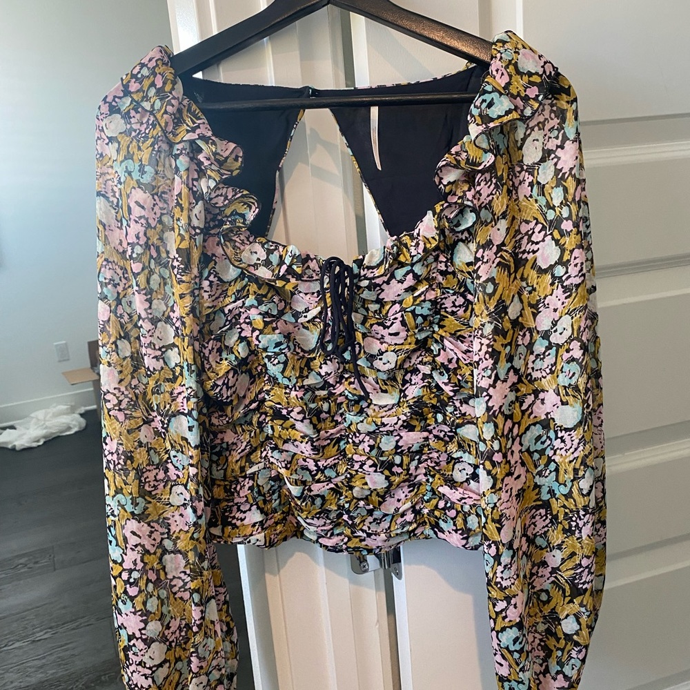 3 different Free People tops - selling each for 35.